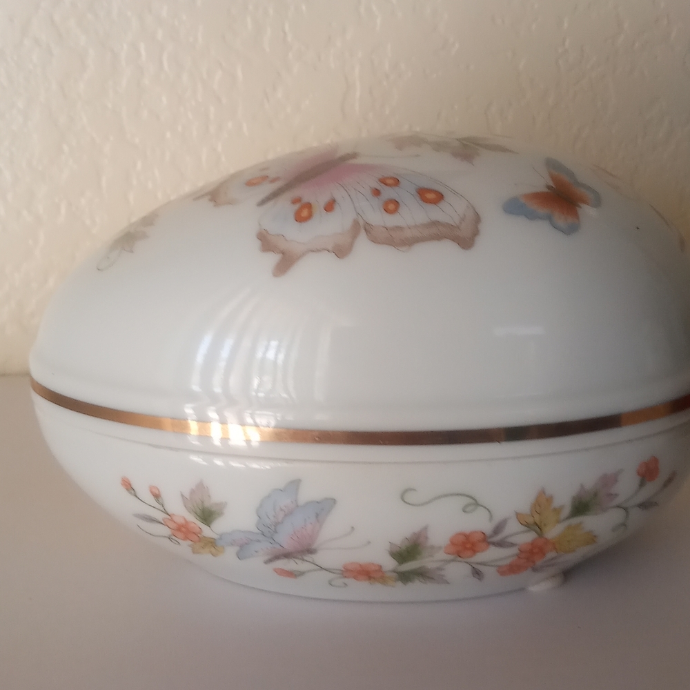 AVON 22 KT GOLD. CONTAINER